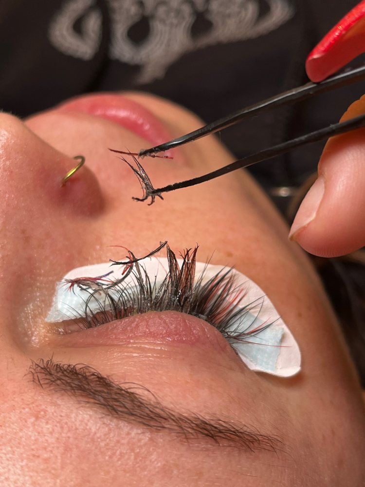 Shianne applying lash extensions