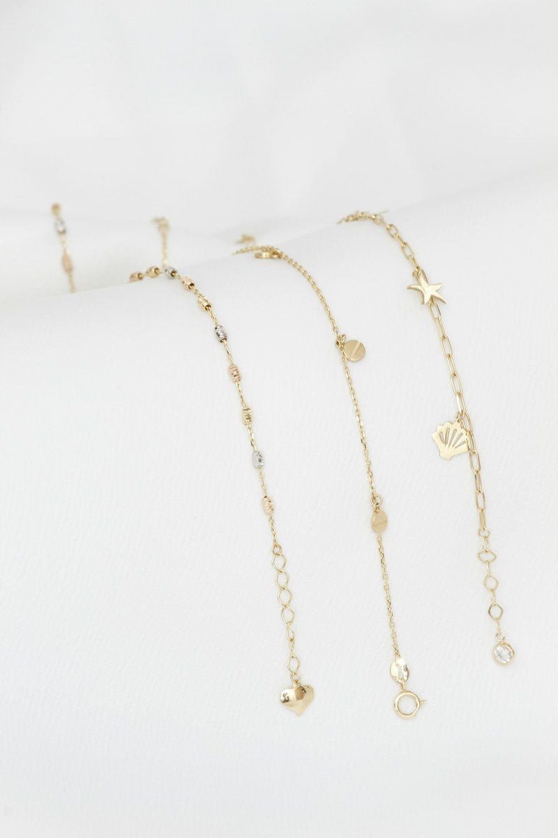 Dainty gold charm bracelets